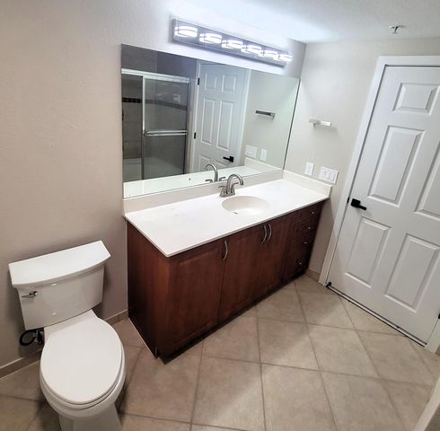 6418 EMERALD DUNES Drive 201, West Palm Beach, FL 33411