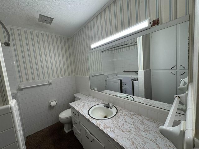 216 W 14th St, Smackover, AR 71762