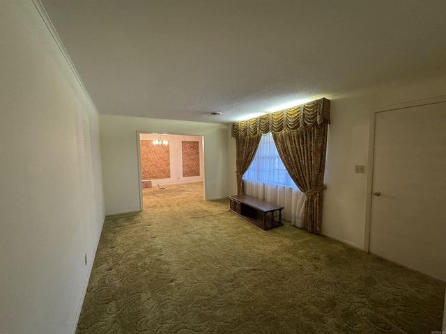 216 W 14th St, Smackover, AR 71762