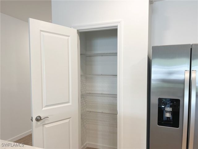 27831 Solis Grande Drive, Bonita Springs, FL 34135