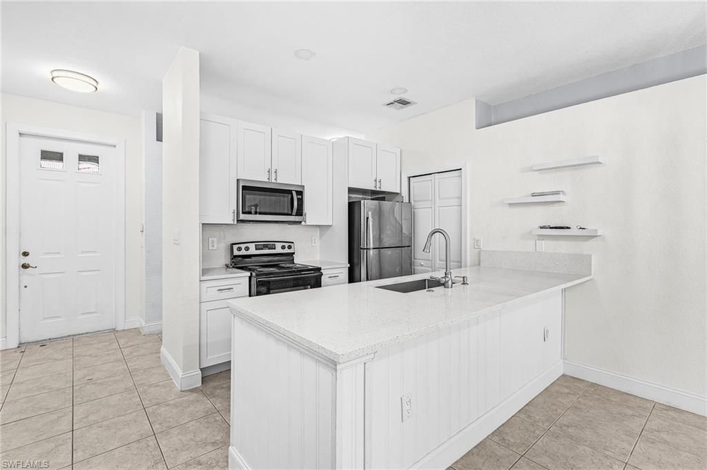 7542 Bristol CIR, NAPLES, FL 34120 — photo 4