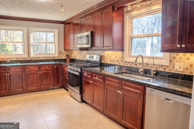 437 Sweetgum Drive, Woodstock, GA 30188