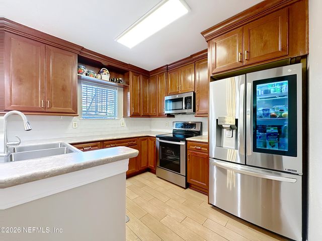 1800 THE GREENS Way 1801, Jacksonville Beach, FL 32250