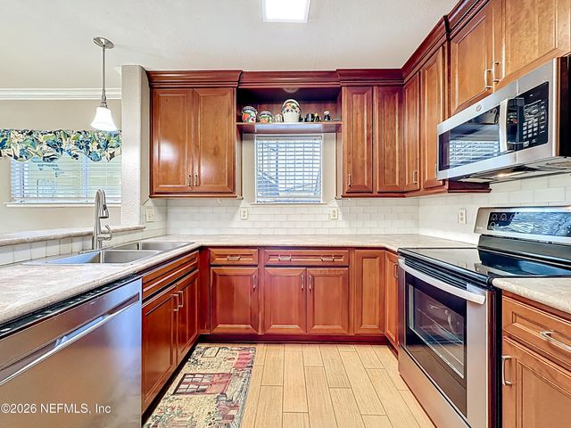 1800 THE GREENS Way 1801, Jacksonville Beach, FL 32250