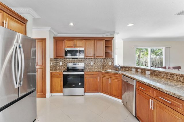 5218 Rising Comet Lane, Greenacres, FL 33463