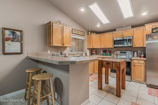 8862 N Mac Arthur Way, Hayden, ID 83835