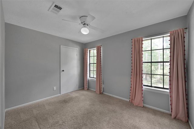 14 E Wandering Oak Drive, The Woodlands, TX 77381