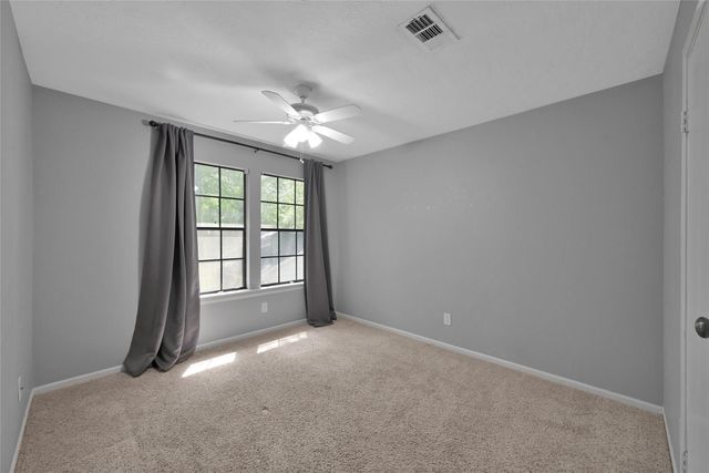 14 E Wandering Oak Drive, The Woodlands, TX 77381