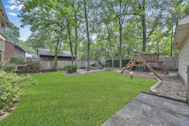 14 E Wandering Oak Drive, The Woodlands, TX 77381