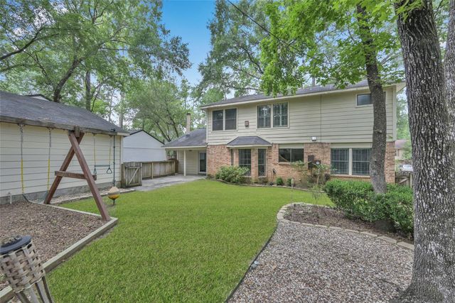 14 E Wandering Oak Drive, The Woodlands, TX 77381