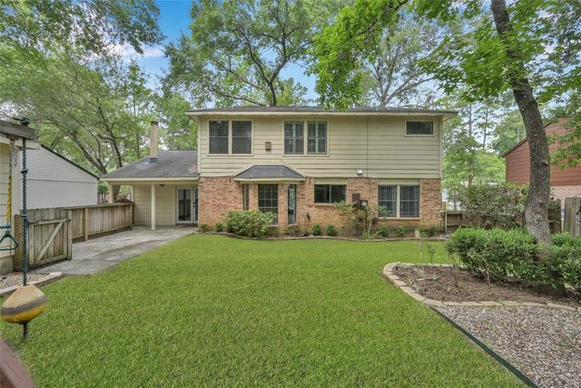 14 E Wandering Oak Drive, The Woodlands, TX 77381