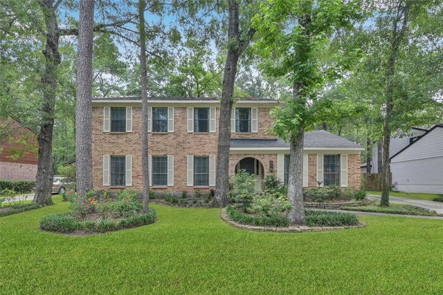14 E Wandering Oak Drive, The Woodlands, TX 77381