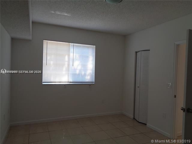 3271 Sabal Palm Mnr 103, Davie, FL 33024