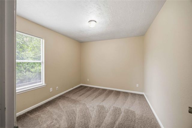 14113 Broken Arrow Drive, Willis, TX 77378