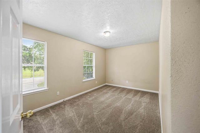 14113 Broken Arrow Drive, Willis, TX 77378