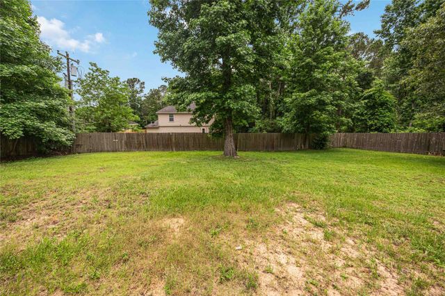 14113 Broken Arrow Drive, Willis, TX 77378
