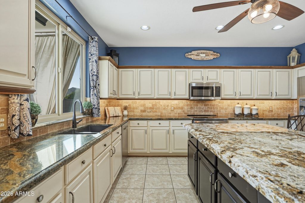 Image 10 of property listing at 9563 E JAVELINA Avenue, Mesa, AZ 85209