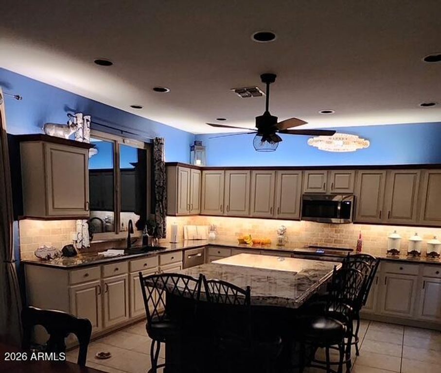 Image 12 of property listing at 9563 E JAVELINA Avenue, Mesa, AZ 85209