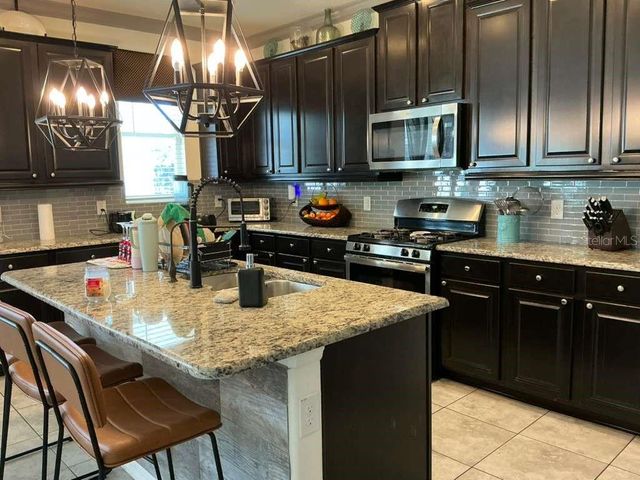 1002 BERRY LEAF COURT, Apopka, FL 32703