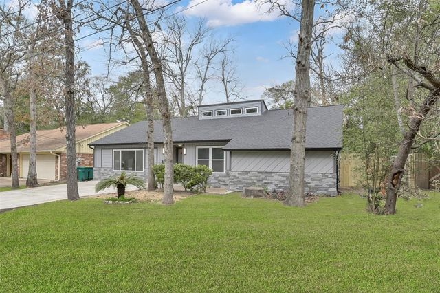 13 Moon Valley Court, Panorama Village, TX 77304