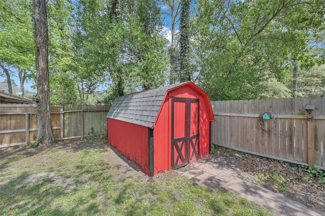 13 Moon Valley Court, Panorama Village, TX 77304