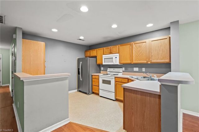 6209 Birdie Court, Whitsett, NC 27377