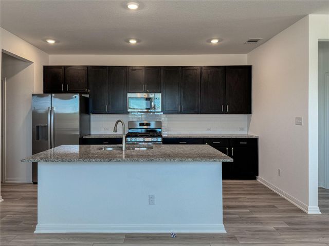 219 Mad Pupper DR, Buda, TX 78610