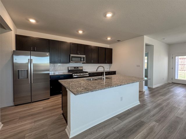 219 Mad Pupper DR, Buda, TX 78610