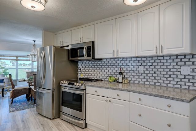 1142 Barefoot Circle, Barefoot Bay, FL 32976