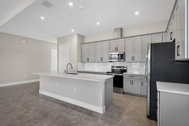 1262 CHAMPIONS DRIVE, Daytona Beach, FL 32124