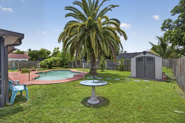 254 LA MANCHA Avenue, Royal Palm Beach, FL 33411