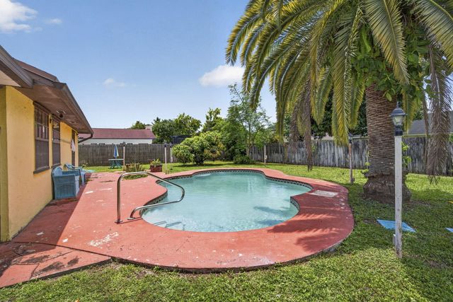 254 LA MANCHA Avenue, Royal Palm Beach, FL 33411