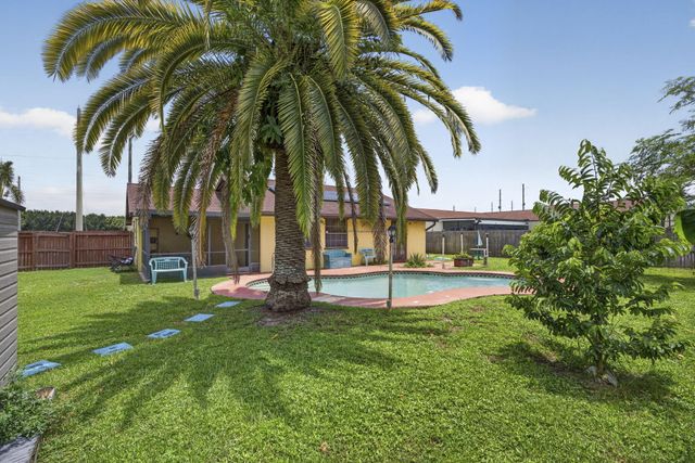 254 LA MANCHA Avenue, Royal Palm Beach, FL 33411