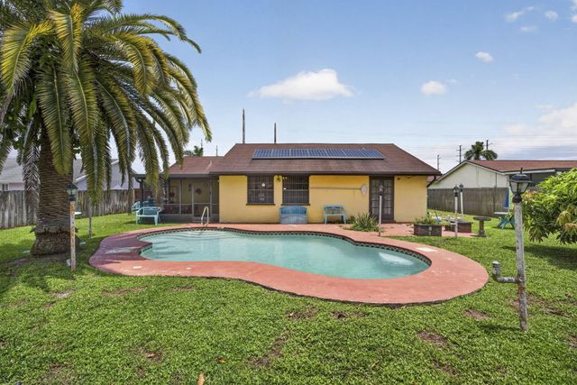 254 LA MANCHA Avenue, Royal Palm Beach, FL 33411