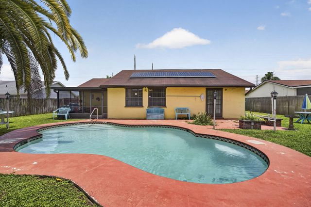 254 LA MANCHA Avenue, Royal Palm Beach, FL 33411