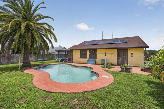 254 LA MANCHA Avenue, Royal Palm Beach, FL 33411