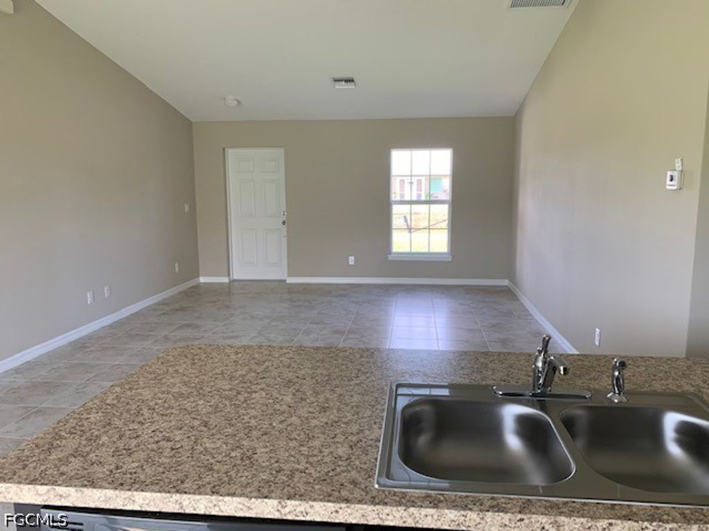 Image 4 of property listing at 2413 NW 29th ST, Cape Coral, FL 33993