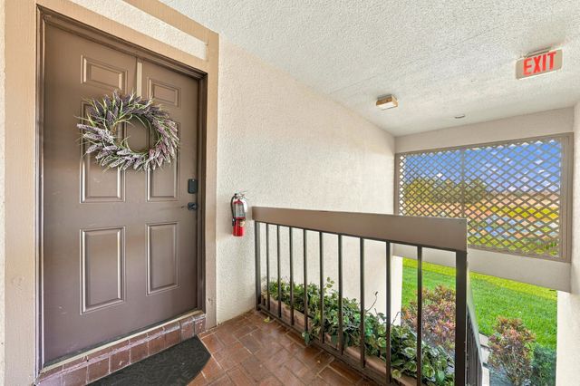 1111 DUNCAN Circle 202, Palm Beach Gardens, FL 33418
