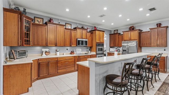 8044 LAKE HATCHINEHA ROAD, Haines City, FL 33844