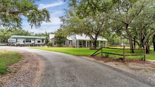 8044 LAKE HATCHINEHA ROAD, Haines City, FL 33844