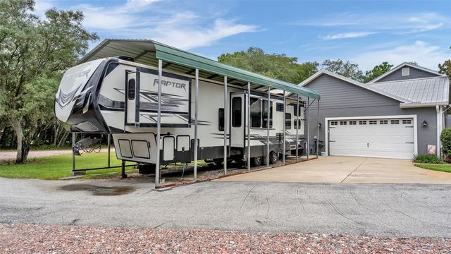 8044 LAKE HATCHINEHA ROAD, Haines City, FL 33844