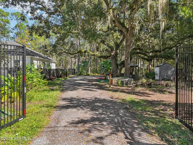 1265 WHISPERING PINES Road, St. Johns, FL 32259