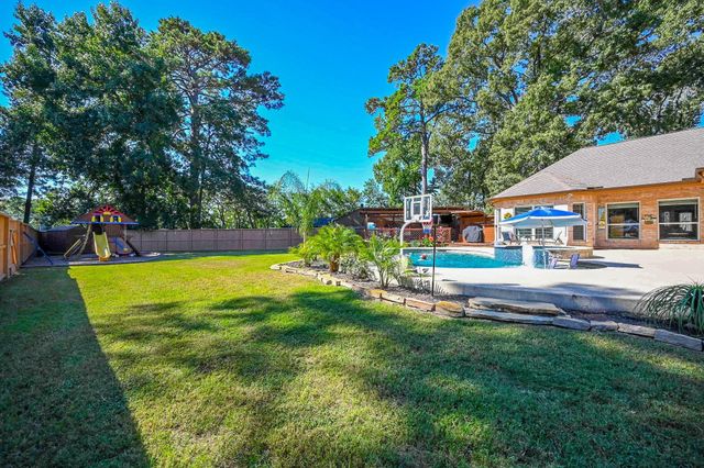 75 April Wind Drive S, Conroe, TX 77356