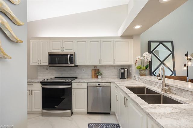 7564 Silver Trumpet LN U202, Naples, FL 34109