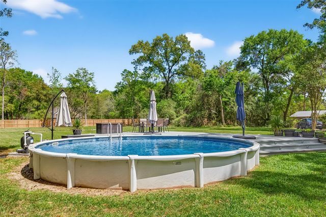 819 Sentinel Oaks, Pinehurst, TX 77362