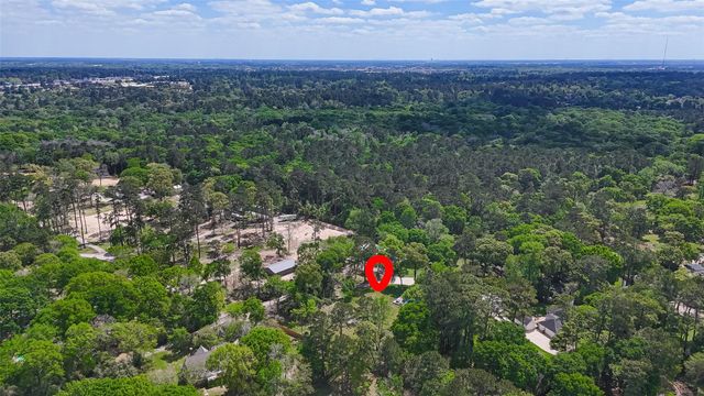 819 Sentinel Oaks, Pinehurst, TX 77362