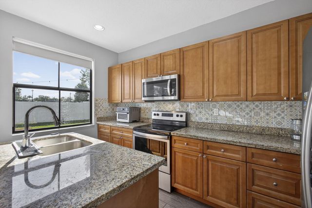 6017 Pine Tree Way, Riviera Beach, FL 33410