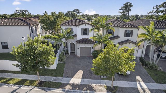 6017 Pine Tree Way, Riviera Beach, FL 33410