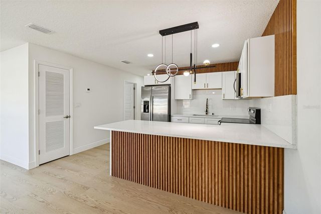 7910 W POWHATAN AVENUE, Tampa, FL 33615