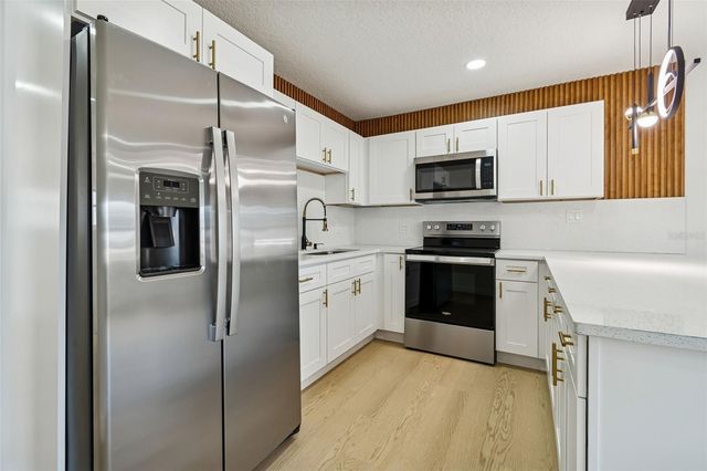 7910 W POWHATAN AVENUE, Tampa, FL 33615